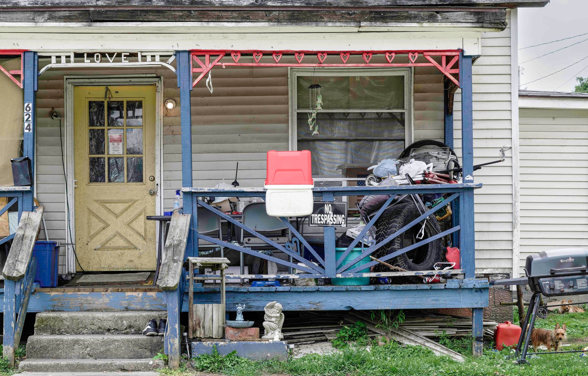 Clutter art, or, can you believe how much crap is on that porch?